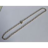 A 9 carat oval link chain. Approx. 5 grams. Est. £