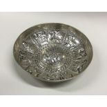 An unusual Greek silver dish decorated with animal