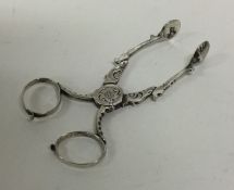 A good pair of 18th Century silver sugar nips with