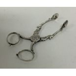 A good pair of 18th Century silver sugar nips with