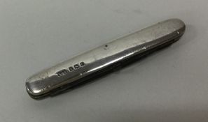 An Edwardian silver combination travelling knife.