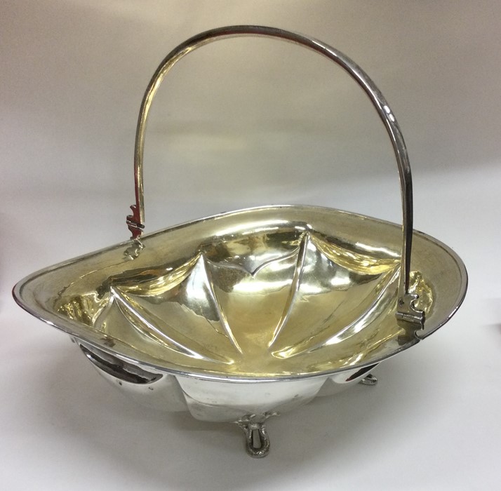 RUSSIAN: A large silver and silver gilt swing hand