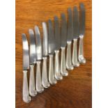 A good set of ten silver pistol handled dinner kni