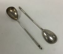 RUSSIAN: A pair of silver preserve spoons with tap