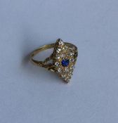 A Victorian sapphire and diamond marquise shaped c