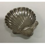 An Edwardian silver butter shell. London. Approx.