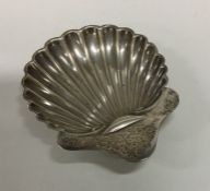 An Edwardian silver butter shell. London. Approx.