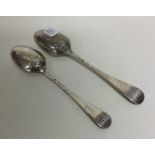 A matched pair of silver shell back teaspoons. Lon