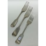 A group of three fiddle pattern silver table forks