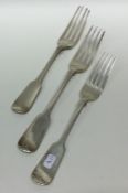 A group of three fiddle pattern silver table forks