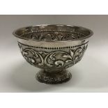 An Edwardian silver pedestal bowl decorated with a