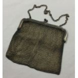 A heavy silver mesh purse. London. Approx. 230 gra