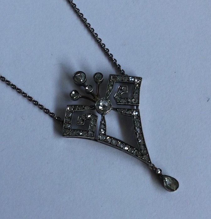 A good diamond drop pendant of stylised form on fi - Image 2 of 3