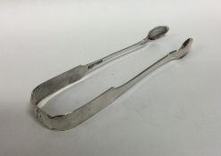 A pair of American Provincial silver sugar tongs.