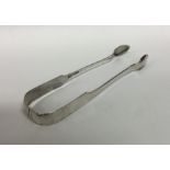 A pair of American Provincial silver sugar tongs.