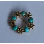 A heavy 9 carat and turquoise brooch of modernisti