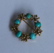 A heavy 9 carat and turquoise brooch of modernisti