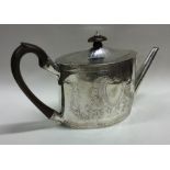 A good George III bright cut silver teapot attract