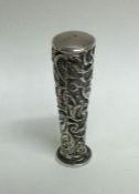 A tapering silver seal embossed with flowers and l