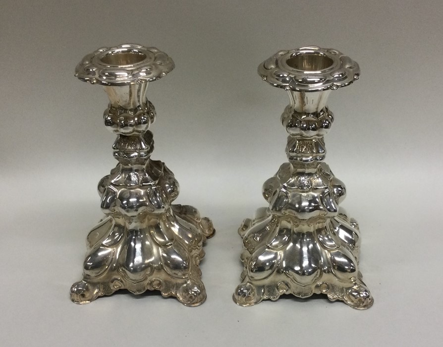 A pair of stylish Continental silver candlesticks