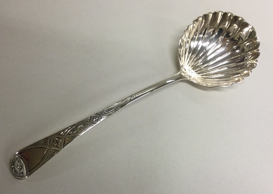 A George III silver sauce ladle with fluted bowl. - Image 2 of 2