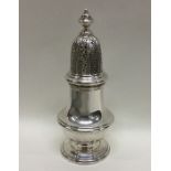 A good quality heavy silver sugar caster of Georgi