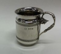 An attractive silver christening cup decorated wit