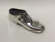 A good silver model of shoe in the form of a pin c