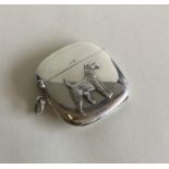 An unusual silver vesta case mounted with a dog wi