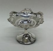 An Edwardian silver sweet dish of typical design.