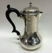 An Edwardian silver baluster shaped water jug. Lon