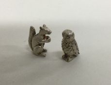 An Edwardian silver miniature figure of an owl tog