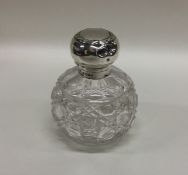 A silver mounted hobnail cut hinged top scent bott