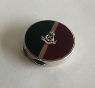 A heavy silver and enamelled Regimental compact. R