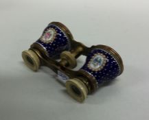 A pair of royal blue enamelled opera glasses with