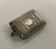 An engine turned silver vesta case with hinged top