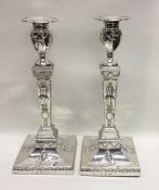 A good pair of Georgian silver candlesticks attrac