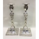 A good pair of Georgian silver candlesticks attrac