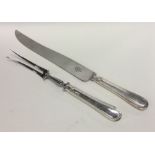 A silver two piece carving set. London 1998. By Ma
