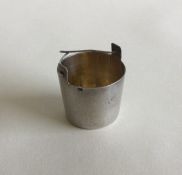 RUSSIAN: A silver tea strainer with gilt interior