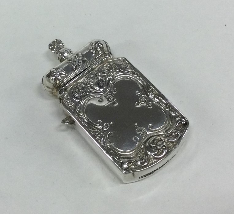 A heavy silver vesta mounted with Royal Crown. App
