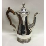 A Georgian silver baluster shaped coffee pot with