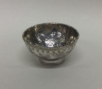 A small attractive silver bowl of Chinese design.