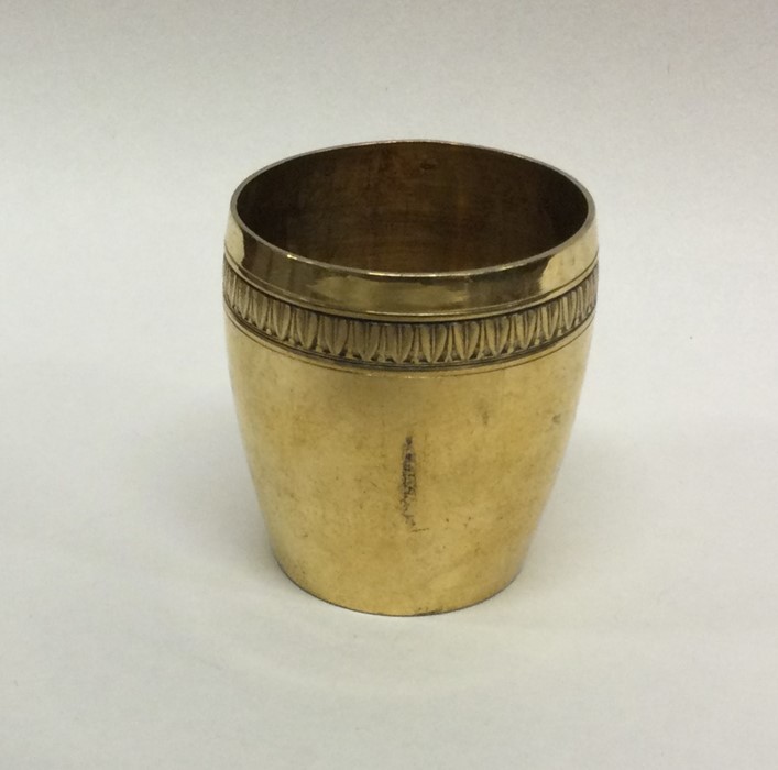 A heavy Continental silver gilt goblet of tapering