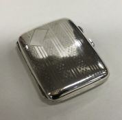 A stylish silver cigarette case decorated with str