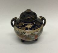 A Japanese porcelain pot pourri. Approx. 8 cms hig