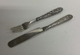 A good Chinese silver christening knife and fork.