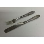 A good Chinese silver christening knife and fork.