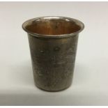 A Continental silver thimble shaped beaker decorat