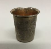 A Continental silver thimble shaped beaker decorat